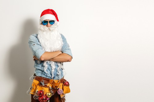Holiday plumbing tips from a plumber dressed as santa.